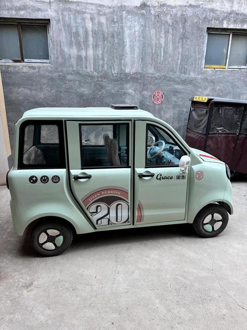 金彭电动四轮车价格及图片,宗电动三轮车价格及图片